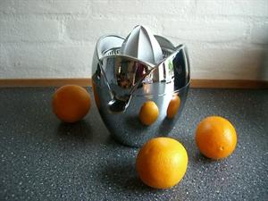 Elektrisk citron-, grape-og appelsinpresser i stilfuldt fransk design